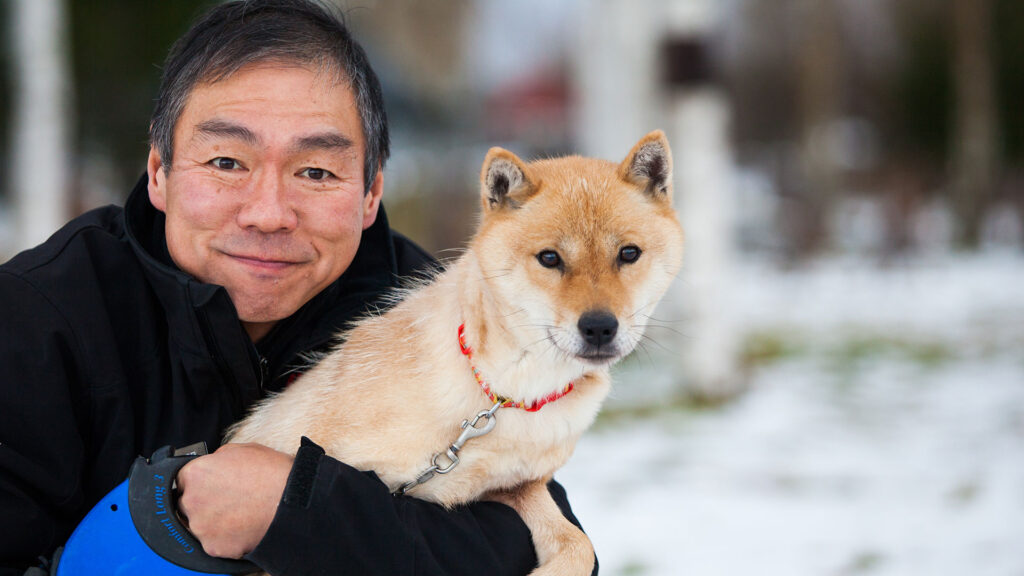 Hokkaido dog with its owmer